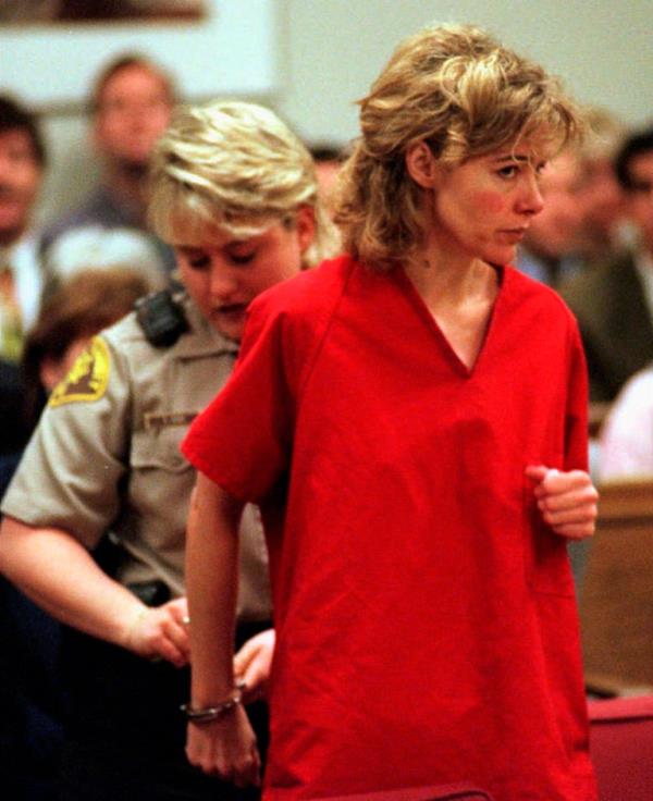  In this Feb. 6, 1998, file photo, former grade school teacher Mary Kay Letourneau has her handcuffs removed at the start of a hearing in Seattle, wher<em></em>e she was re-sentenced to 7 1/2 years in jail for violating her parole. Letourneau married her former sixth-grade student after she was co<em></em>nvicted for raping him.