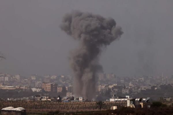 A picture taken from the southern Israeli city of Sderot on October 26, 2023, shows black smoke billowing over the northern Gaza Strip, amid the o<em></em>ngoing war between Israel and the Palestinian group Hamas.