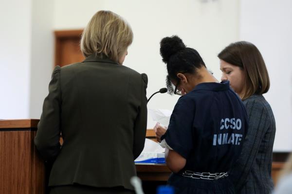 Elizabeth Archibeque reads a statement during her sentencing hearing in Coco<em></em>nino County's District 1 Courtroom Thursday, July 27, 2023