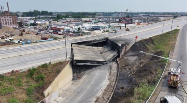 A view of the aftermath of the collapse of a part of I-95 highway after a fuel tanker exploded beneath it, in Philadelphia.