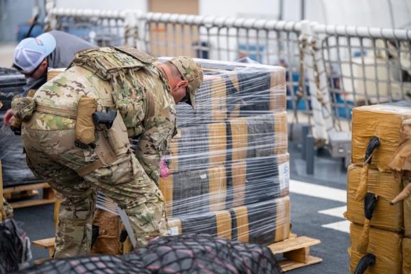 Crew members from the U.S. Coast Guard Cutter Munro (WMSL 755) offloads 33,768 pounds of cocaine, in San Diego, May 28, 2024