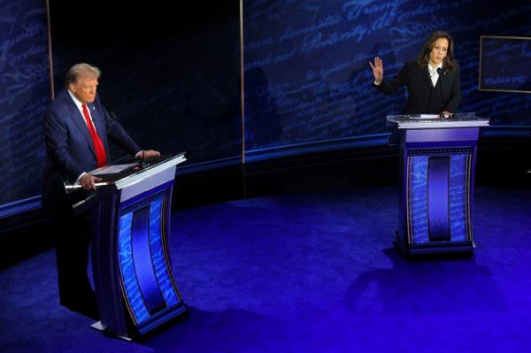 Democratic presidential nominee, U.S. Vice President Kamala Harris speaks during a presidential debate hosted by ABC as Republican presidential nominee, former U.S. President Do<em></em>nald Trump listens, in Philadelphia, Pennsylvania.