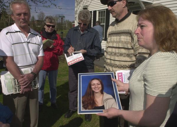 Bruce Maitland and Kellie Maitland sharing a photo of their missing daughter, Brianna, at a news co<em></em>nference alo<em></em>ngside Fred Murray