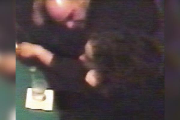 Blurry surveillance footage from 2006 capturing a woman, possibly Brianna Maitland, gambling at Caesars Atlantic City Hotel Casino.