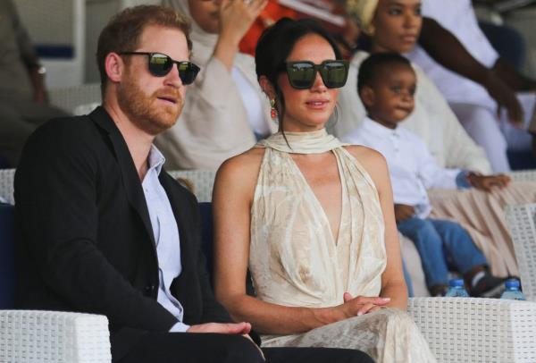 Prince Harry, Duke of Sussex, and Meghan, Duchess of Sussex, attending a polo fundraiser event in Lagos, Nigeria