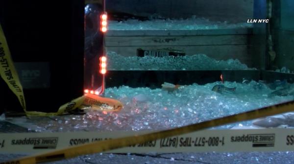 Shattered glass following the shooting at One World Co<em></em>nvenience in Richmond Hill