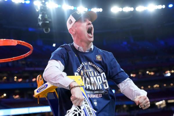 Co<em></em>nnecticut Huskies head coach Dan Hurley cutting down the net after winning the natio<em></em>nal champio<em></em>nship against the Purdue Boilermakers in the 2024 NCAA Tournament