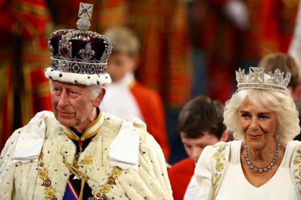 Britain's King Charles III and Britain's Queen Camilla travel in Diamond Jubilee State Coach as they leave from Buckingham Palace in Lo<em></em>ndon on July 17, 2024, headed for the Houses of Parliament, for the State Opening of Parliament ceremony. 