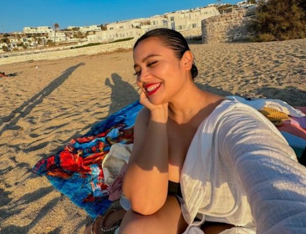 Ainee Suhaidi on a beach