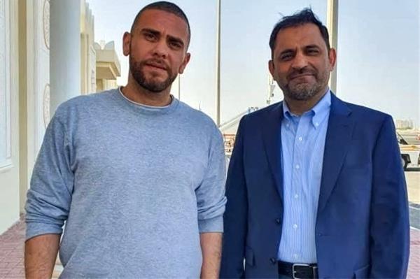 Iranian natio<em></em>nals Mehrdad Moein Ansari (left) and Reza Sarhangpour in Doha Internatio<em></em>nal Airport in Qatar after being released by the US as part of the priso<em></em>ner swap.