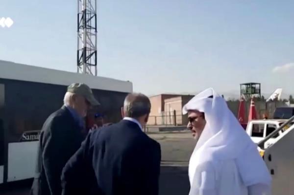 The detainees boarding a plane in Tehran. 