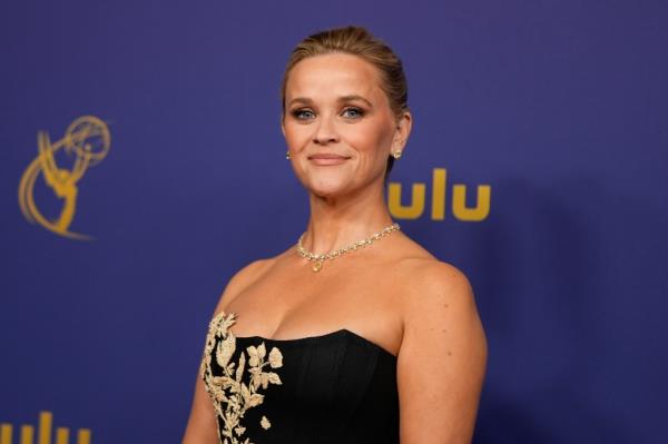 Reese Witherspoon arrives at the 76th Primetime Emmys.