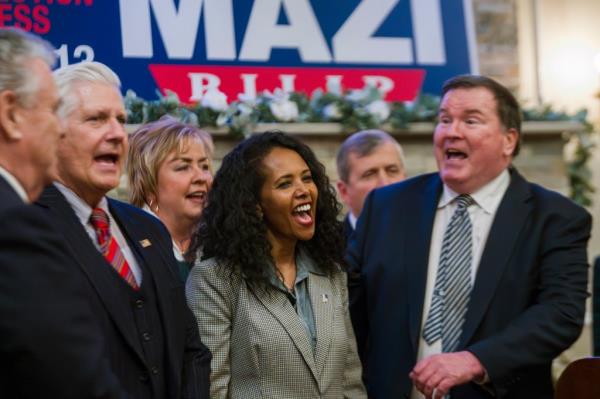 Mazi Pilip greets attendees of GOP fundraiser event.