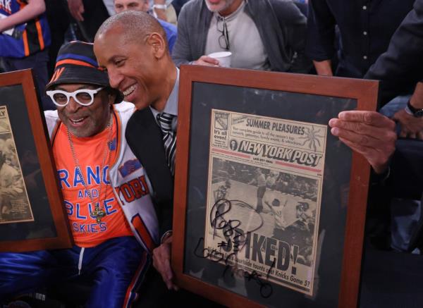 Pacers great Reggie Miller autographs two f<em></em>ramed newspapers for Spike Lee -- including their infamous 1994 back page.