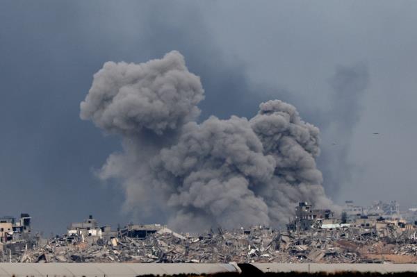 Smoke clouds covered the Gaza Strip on Thursday following Israeli bombardments.