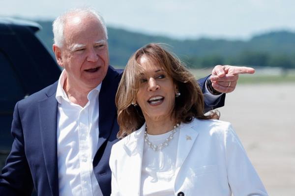 Kamala Harris and her newly named running mate Minnesota Gov. Tim Walz arrive at Chippewa Valley Regio<em></em>nal Airport in Eau Claire, Wisconsin.