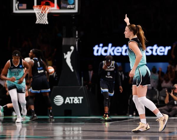 at Barclays Center- Sabrina Io<em></em>nescu #20 of the New York Liberty makes 3 pointer against the Chicago Sky during their regular season matchup at Barclays Center .