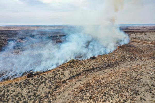 Firefighters battle the Smokehouse Creek Fire north of Canadian, Texas, on Feb. 28, 2024. 