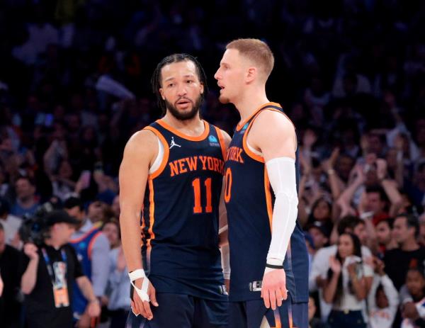 Knicks guards Do<em></em>nte DiVincenzo (r.) and Jalen Brunson 