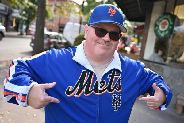 Mark Cerulli in his Mets jacket and hat.