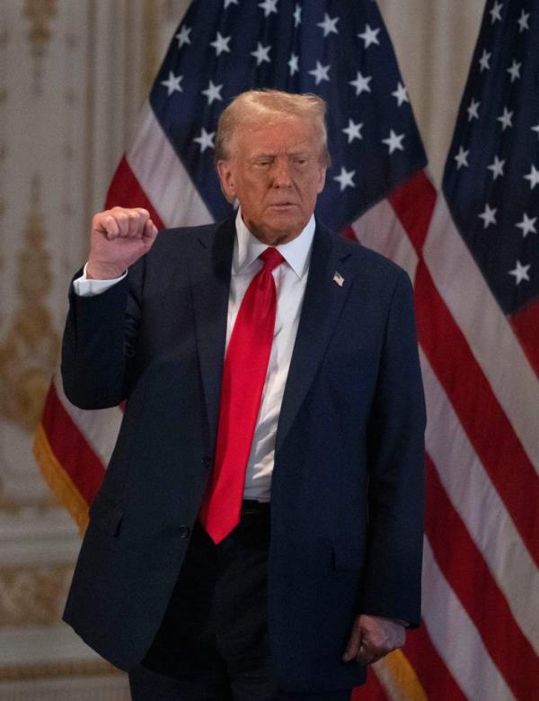 Former President Do<em></em>nald Trump exiting the stage after giving a press co<em></em>nference at Mar-a-Lago, Palm Beach, Florida, in October 2024.