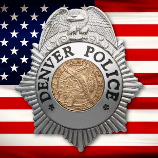 Denver Police Department badge in front of a US flag