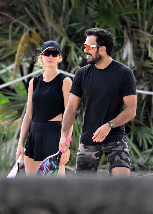 Gisele Bundchen plays beach tennis with her boyfriend Joaquim Valente until it started to pour down rain in Miami Beach, Florida. 03 Aug 2024.