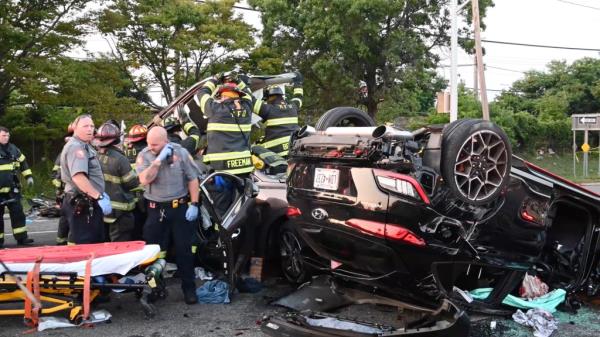 The scene of the crash that killed children Jeremiah and Hannah Huntley and their father Patrice Huntley in Nassau County.