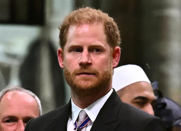 Prince Harry and King Charles III leaving Westminster Abbey after coronation, Photo by Ben Stansall/Pool via AP.