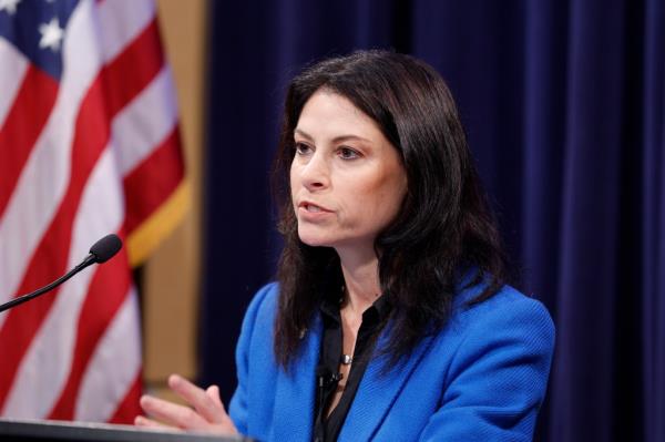 Michigan Attorney General Dana Nessel in blue jacket speaking a<em></em>bout charges against former House Speaker Lee Chatfield for financial crimes