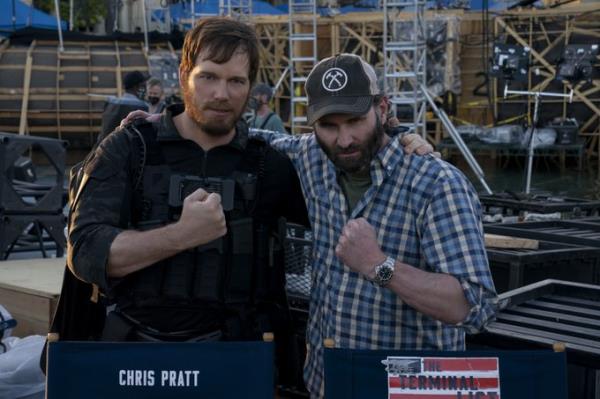 Chris Pratt and Jack Carr on a film set with clenched fists