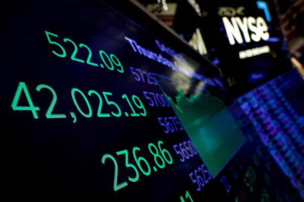 Dow Jo<em></em>nes Industrial Average on screen at New York Stock Exchange.