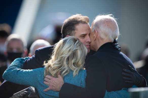 Hunter Biden embraces his parents Jill and Joe in 2021 during Joe Biden’s presidential inauguration ceremony in Washington.