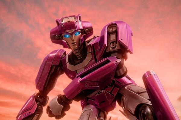 A screenshot from Transformers One shows the character Elita-1, a pink robot, voiced by actress Scarlett Johansson.