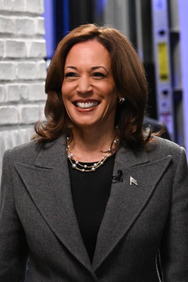 Stephen Colbert and Vice President Kamala Harris smiling on the set of The Late Show, October 8, 2024.