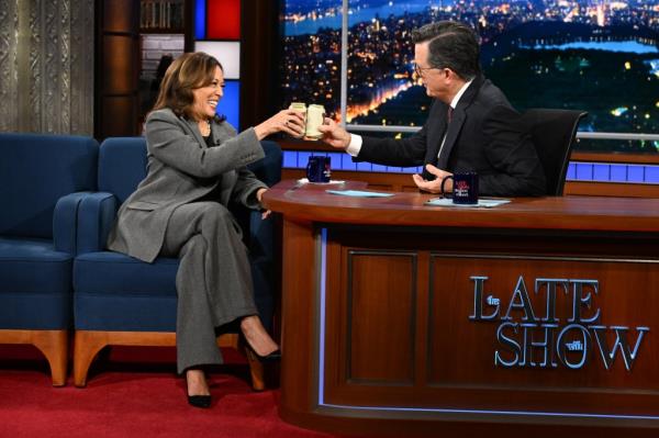 Stephen Colbert interviewing Vice President Kamala Harris on The Late Show stage, October 8, 2024