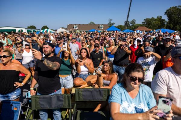 A crowd watching Anthony perform at the Eagle Creek Golf Club and Grill in Moyock, North Carolina on August 19, 2023.