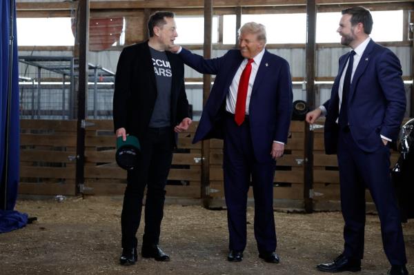 Elon Musk, President-elect Do<em></em>nald Trump and Vice President-elect JD Vance backstage at Butler Farm Show before Butler, Pa. rally on Oct. 5.