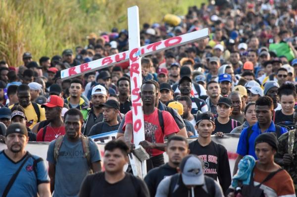 A migrant caravan of at least 8,000 people is heading to the US border.