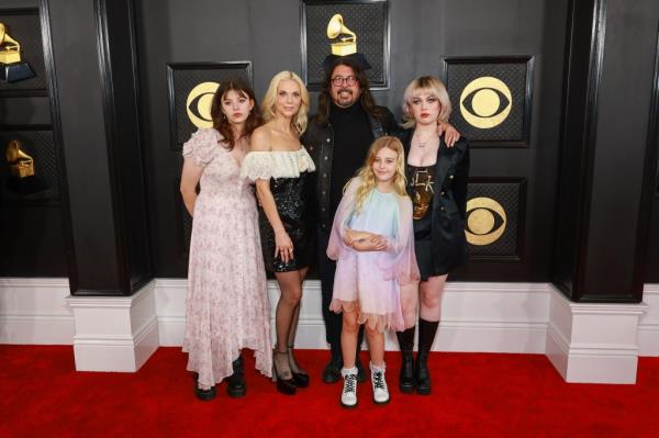 Dave Grohl with his wife and daughters at the 2023 Grammy Awards