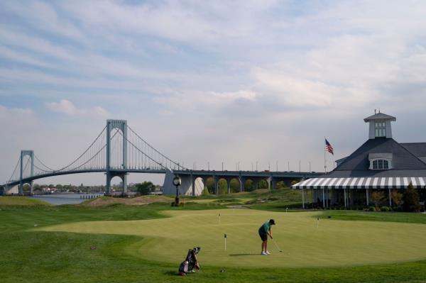 Person golfing at Trump l<em></em>inks