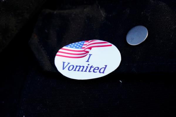 A voter in Boise City, Oklahoma wearing an 'I Vomited' sticker after casting their ballot in the 2024 U.S. Presidential Election