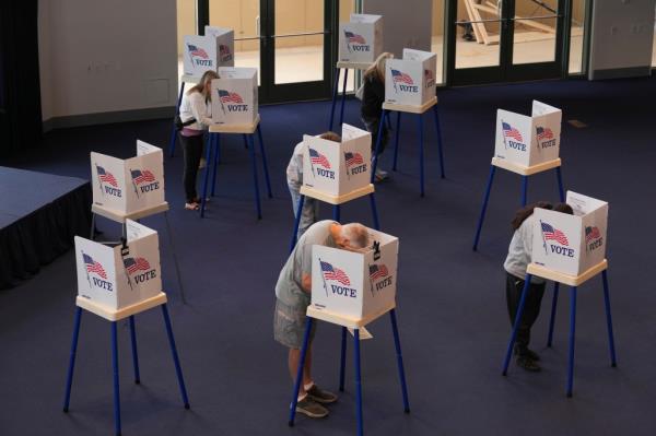 Voters filling out ballots at the Ro<em></em>nald Reagan Presidential Library on Election Day, November 5, 2024, in Simi Valley, California