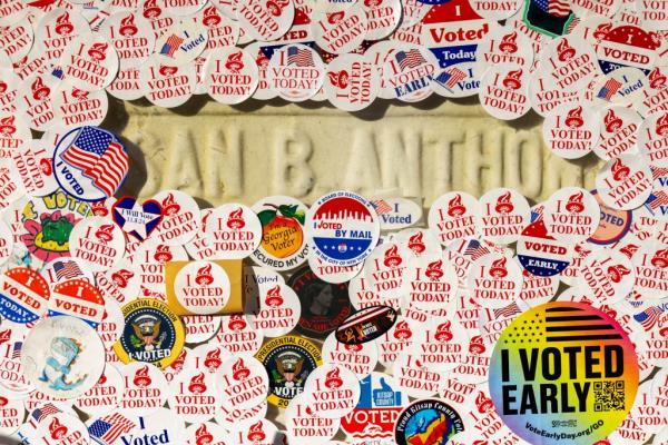 Susan B. Anthony's headstone covered in 'I voted' stickers at Mount Hope Cemetery in Rochester, N.Y., on Election Day, Nov. 5, 2024