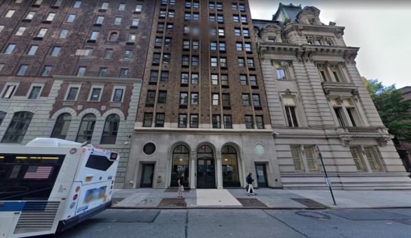 A woman slashed a male tourist she apparently didn't know in front of a Madison Avenue building.