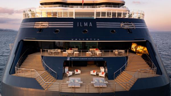 Large Ilma yacht from Ritz Carlton collection featuring 149 cabins, designed to accommodate 448 people, with ample seating on the deck