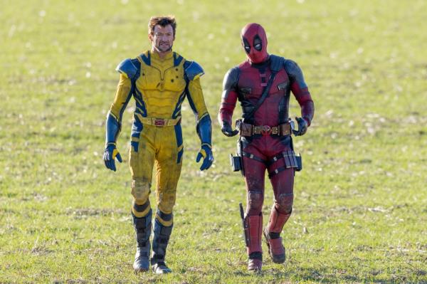 Hugh Jackman and Ryan Reynolds in character as Wolverine and Deadpool