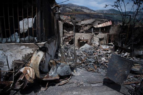 A house destroyed by a fire in northwestern Athens on August 27, 2023.