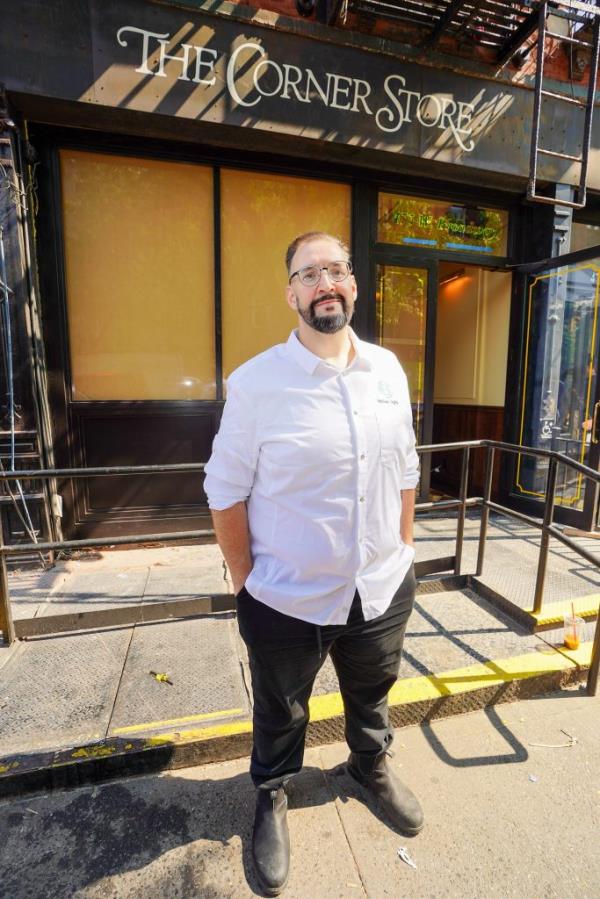 Executive chef Michael Vignolia standing outside the under-co<em></em>nstruction Corner Store restaurant located in SOHO, 475 W Broadway, mhtn; featuring classic New York City dishes on its menu.