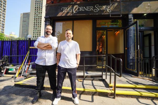 Executive chef Michael Vignolia (left) and owner Eugene Remm outside of The Corner Store.